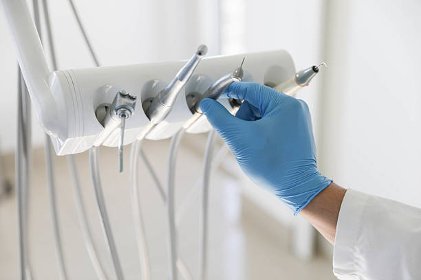 Professional Invisalign Clear Aligners technician working in Manhasset Hills, NY
